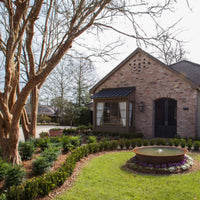 Thumbnail for Sugar Kettle Cast Iron Fountain On Beautiful Garden With Trees  And A House