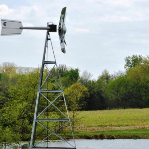 Super Premier Wind Powered Pond Aerator Beside Pond And Trees