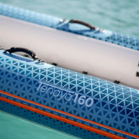 Thumbnail for Tenaya 160 Kayak Close-Up Logo And Handles Resting On Water