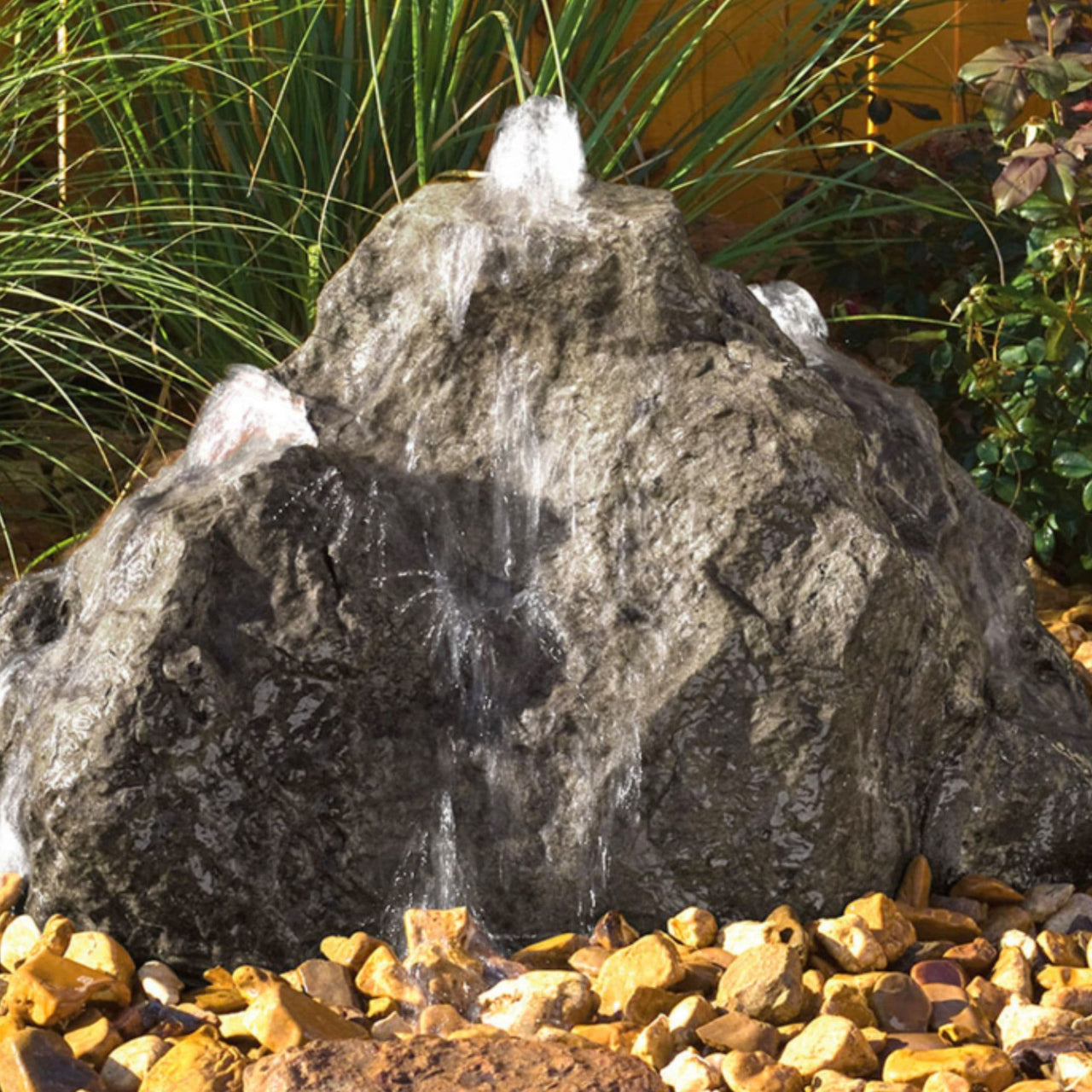 Triple Cascade Stone Outdoor FountainWith Wooden Wall And Green Plants