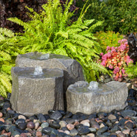 Thumbnail for Triple Falls Fountain With Ferns And Flowers In The Background