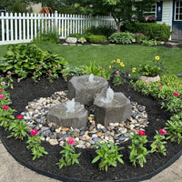 Thumbnail for Triple Falls Garden Stone Fountain Surrounded By Flowers With White Fence Background