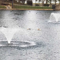 Thumbnail for Vanguard Typhoon 3/4 HP Floating Display Aerator On The Water Two Aerators With Trees In The Background