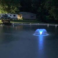 Thumbnail for Vanguard Typhoon 3/4 HP Floating Display Aerator With Blue Lights On The Water & A House In The Background