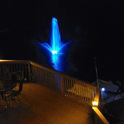 Vanguard Color Changing Fountain LED Lights  Nighttime View Of Lake With Glowing Blue Lighting Beside Wooden Deck