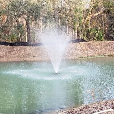 Vanguard Hydro Torque Series Floating Lake Fountain Quiet Pond With Natural Woodland Background