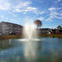 Thumbnail for Vanguard Hydro Torque Series Floating Lake Fountain With A Big Building Background