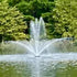 Thumbnail for Vanguard Hydro Torque Series Floating Lake Fountain With Lush Tree-Lined Pond Background