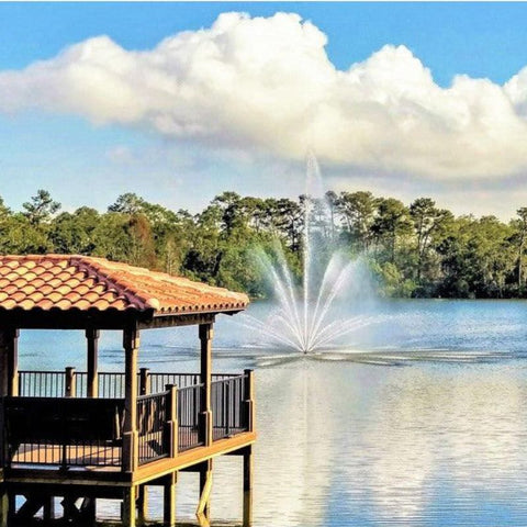 Vertex Vertical TriTier Floating Pond Fountain On The Water With A Pier Close By