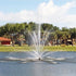 Thumbnail for Vertex Vertical TriTier Pond Fountain On The Water With Trees & Houses In The Background