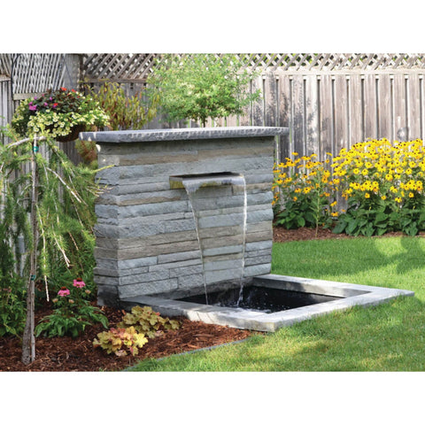 Vianti Falls Spillway Kit With Yellow Flowers And Wooden Fence