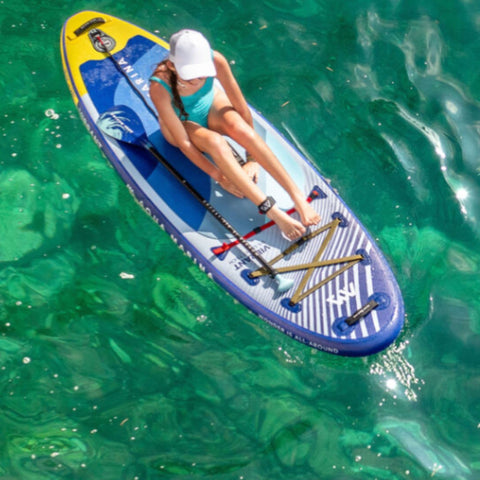 Vibrant SUP With a Girl Riding On The Water