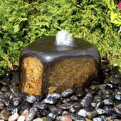 Yoyu Basalt Stone Fountain With Shrubs Background