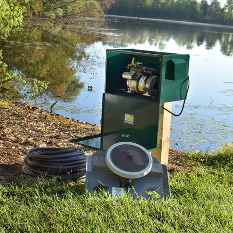 EasyPro PA34 pond aeration system in a post mount cabinet on a lakeside shore