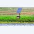 Solaer solar powered aeration system beside a lake and field